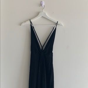 Long black jumpsuit with low back and deep v